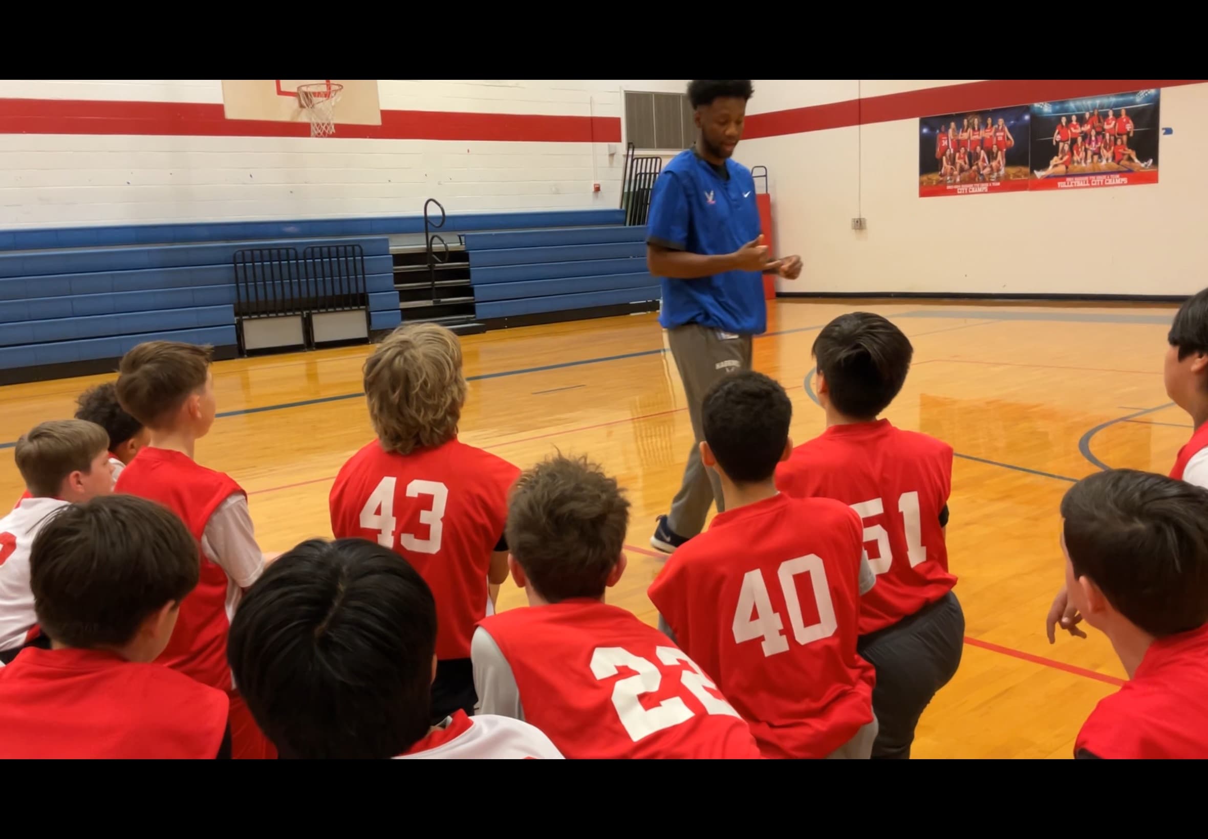 Eric Johnson teaching youth basketball fundamentals